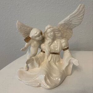 Vintage porcelain figurine angel with a cherub